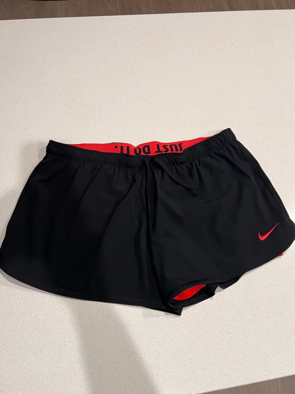 Nike Black Women's Athletic Shorts with Red Trim